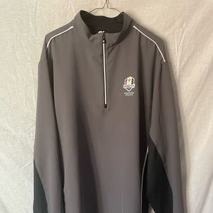 Three quarter zip long sleeve golf shirt w/ 2020 Ryder Cup logo.